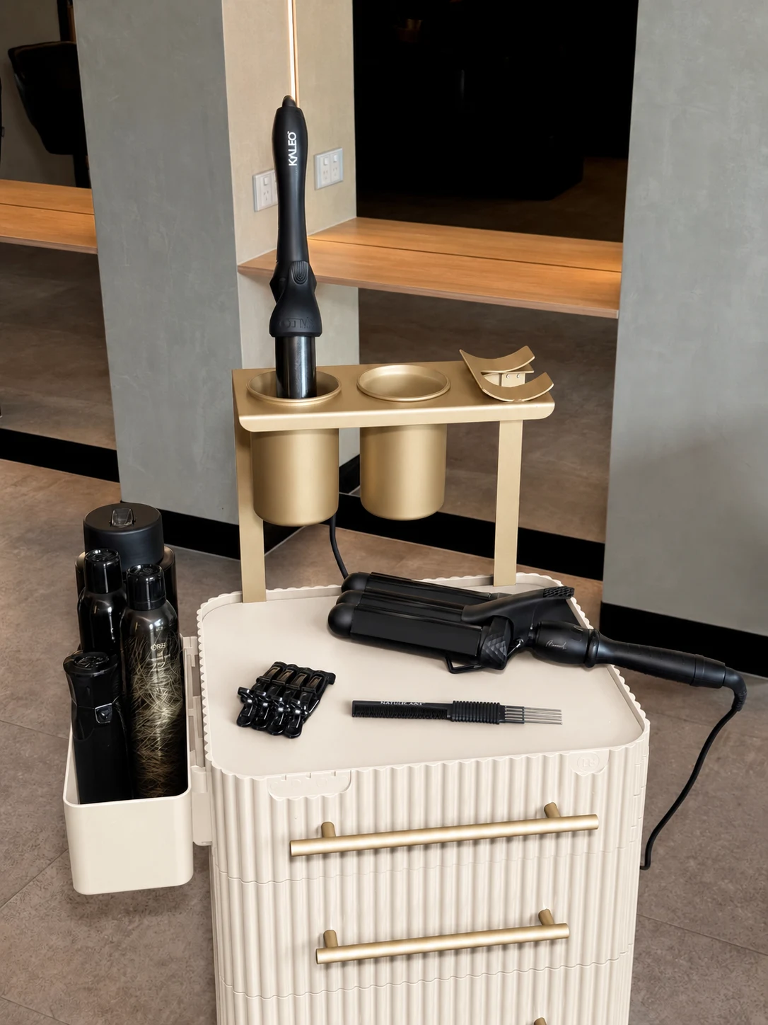Ivory trolley upper tool stations with styling tools on the top